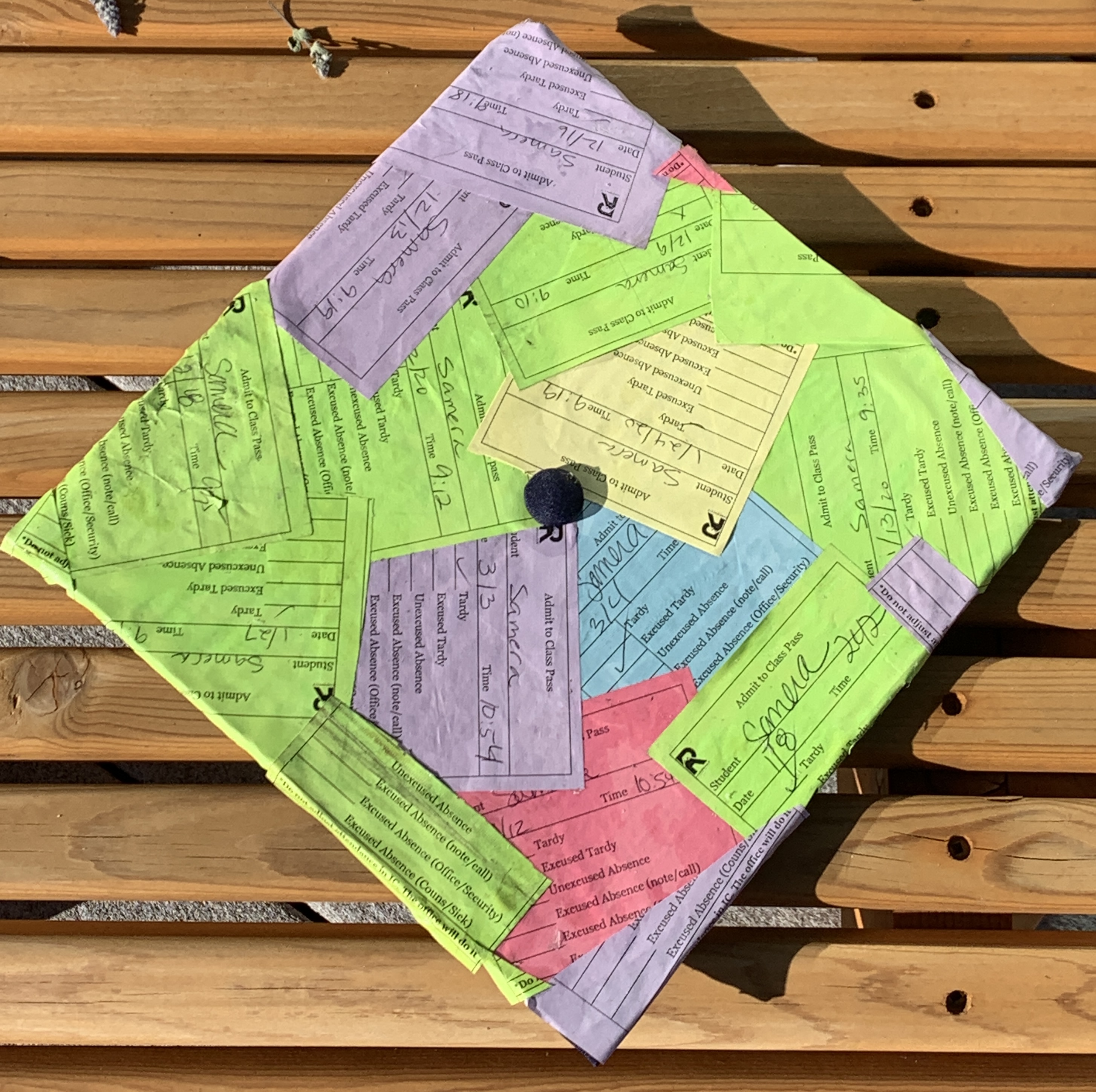 Samera's graduation cap decorated with late passes